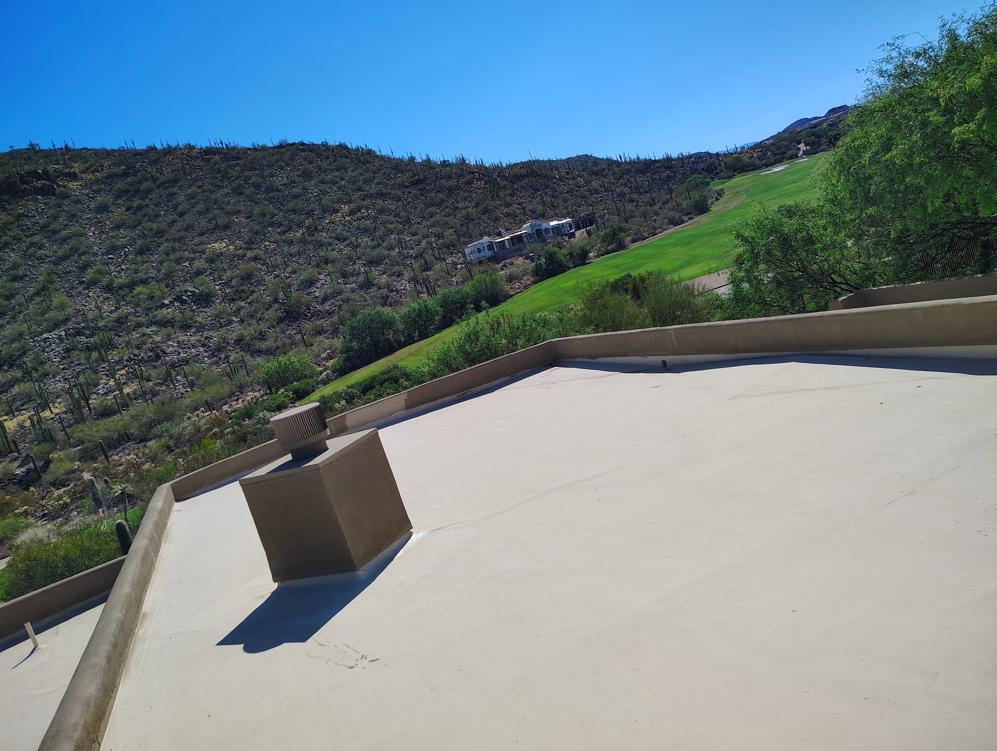 Flat roof prepared for coating above a golf course in Dove Mountain, Marana